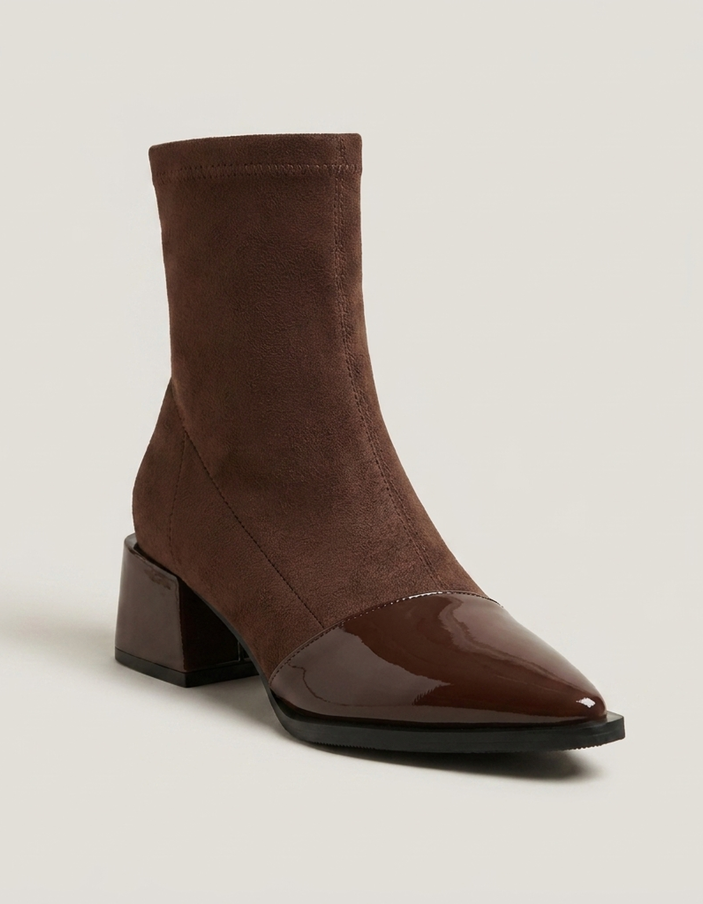 PLUXSTYLE::numise::gloss-detail-block-heel-ankle-boots::closeup-hero