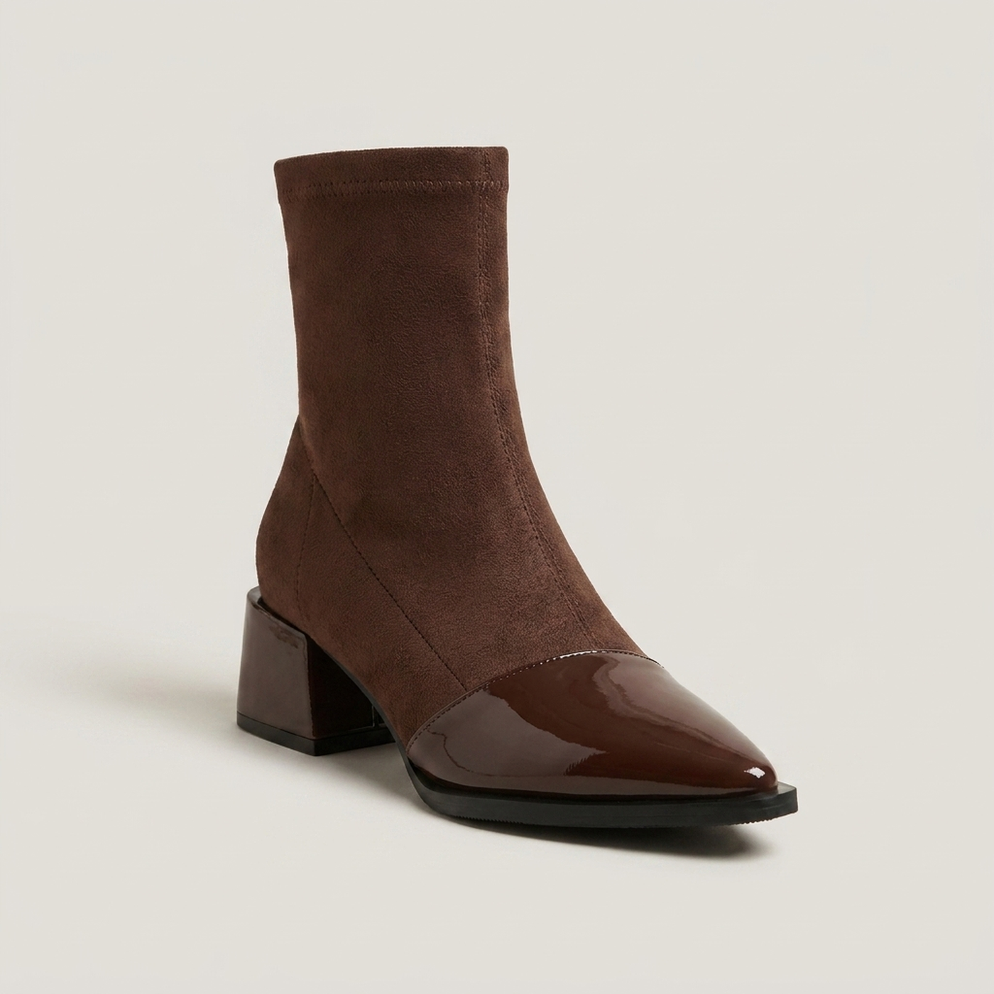 PLUXSTYLE::numise::gloss-detail-block-heel-ankle-boots::closeup-hero