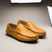 PLUXSTYLE::numise::mens-contrast-stitch-penny-loafers-1::closeup-detail