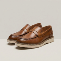PLUXSTYLE::numise::bergamo-polished-penny-loafers::closeup-detail