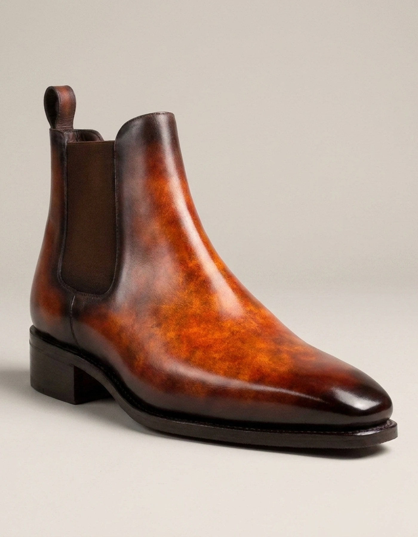 PLUXSTYLE::numise::mens-fire-orange-chelsea-boots::closeup-hero