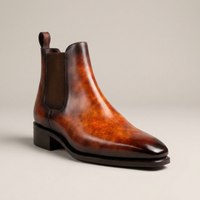 PLUXSTYLE::numise::mens-fire-orange-chelsea-boots::closeup-hero