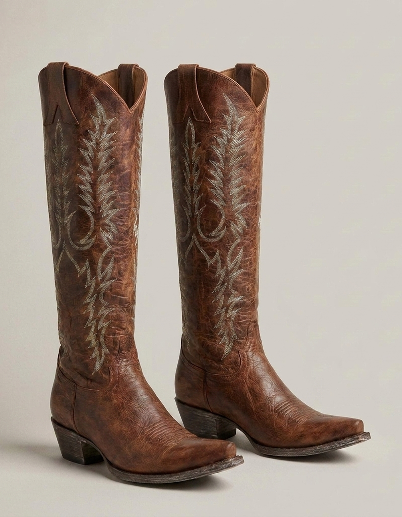 PLUXSTYLE::numise::embroidered-western-knee-high-boots::closeup-detail
