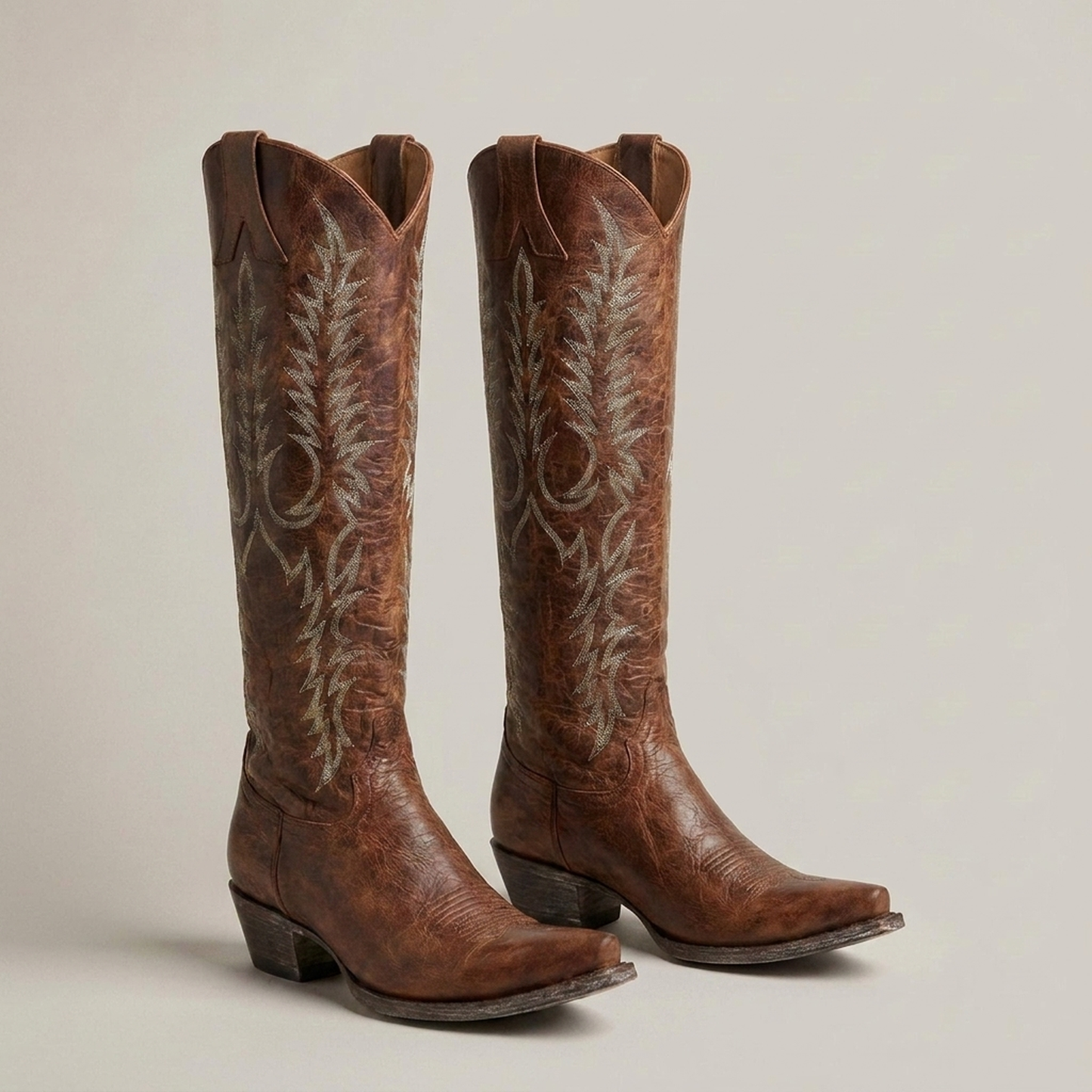 PLUXSTYLE::numise::embroidered-western-knee-high-boots::closeup-detail
